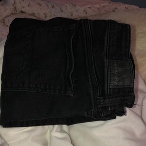 American Eagle black ripped high-rise jeggings.
